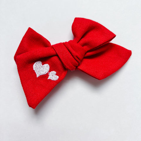 red linen love bow