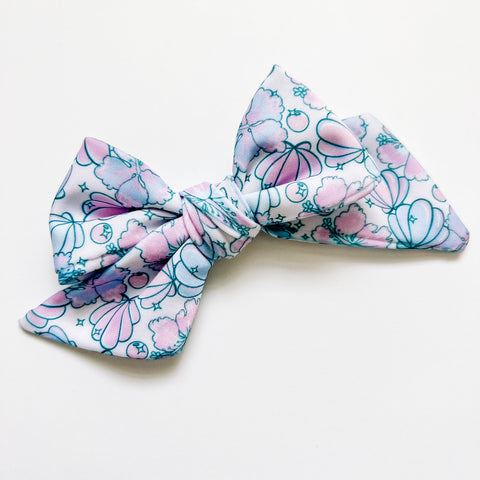 purply shells swim bow