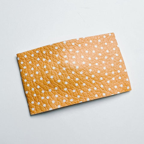 tangerine dot snap clip