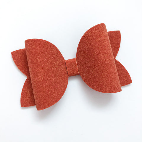 burnt orange suede bow