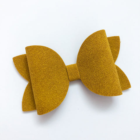 mustard suede bow