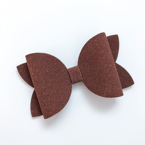 brown suede bow