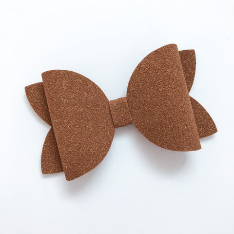 cognac suede bow