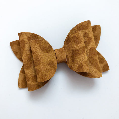 mustard cheetah suede bow