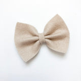 tan felt bow