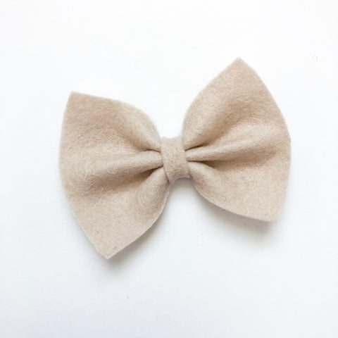 tan felt bow